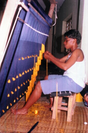 A weaver of the Akwete textile at work