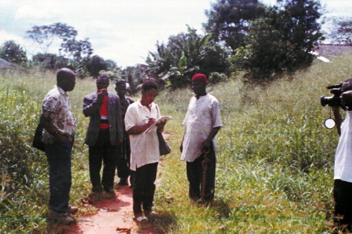 Watching my research assistant take fieldnotes as Chief Oji narrates